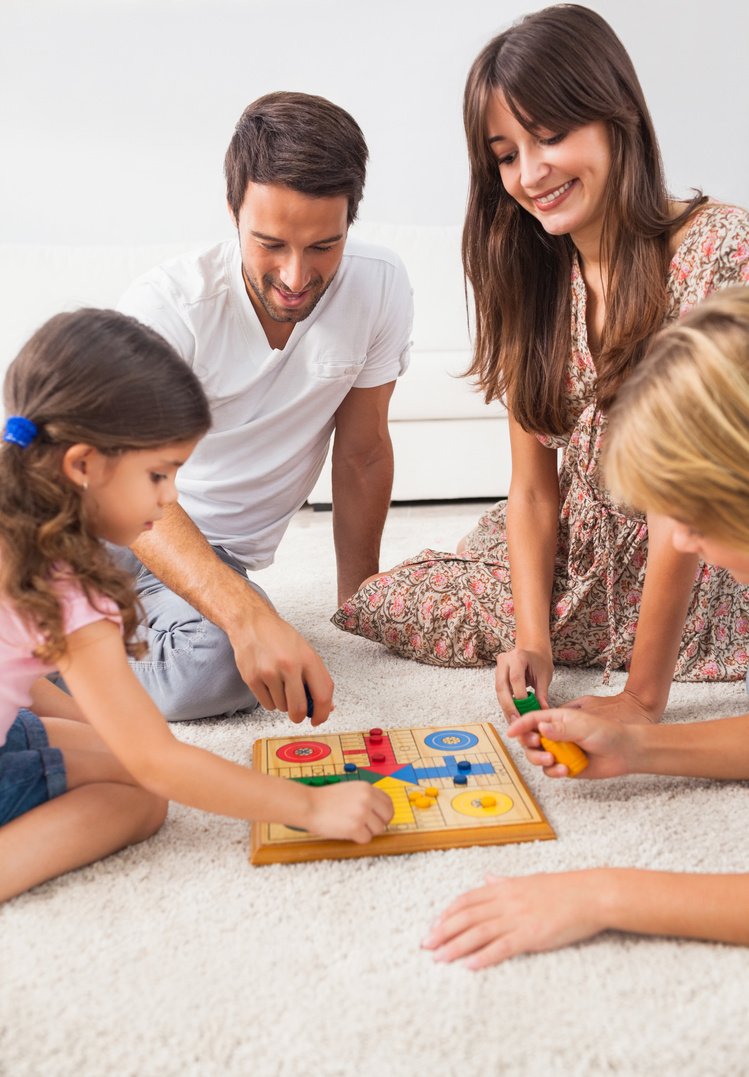 Family playing board game